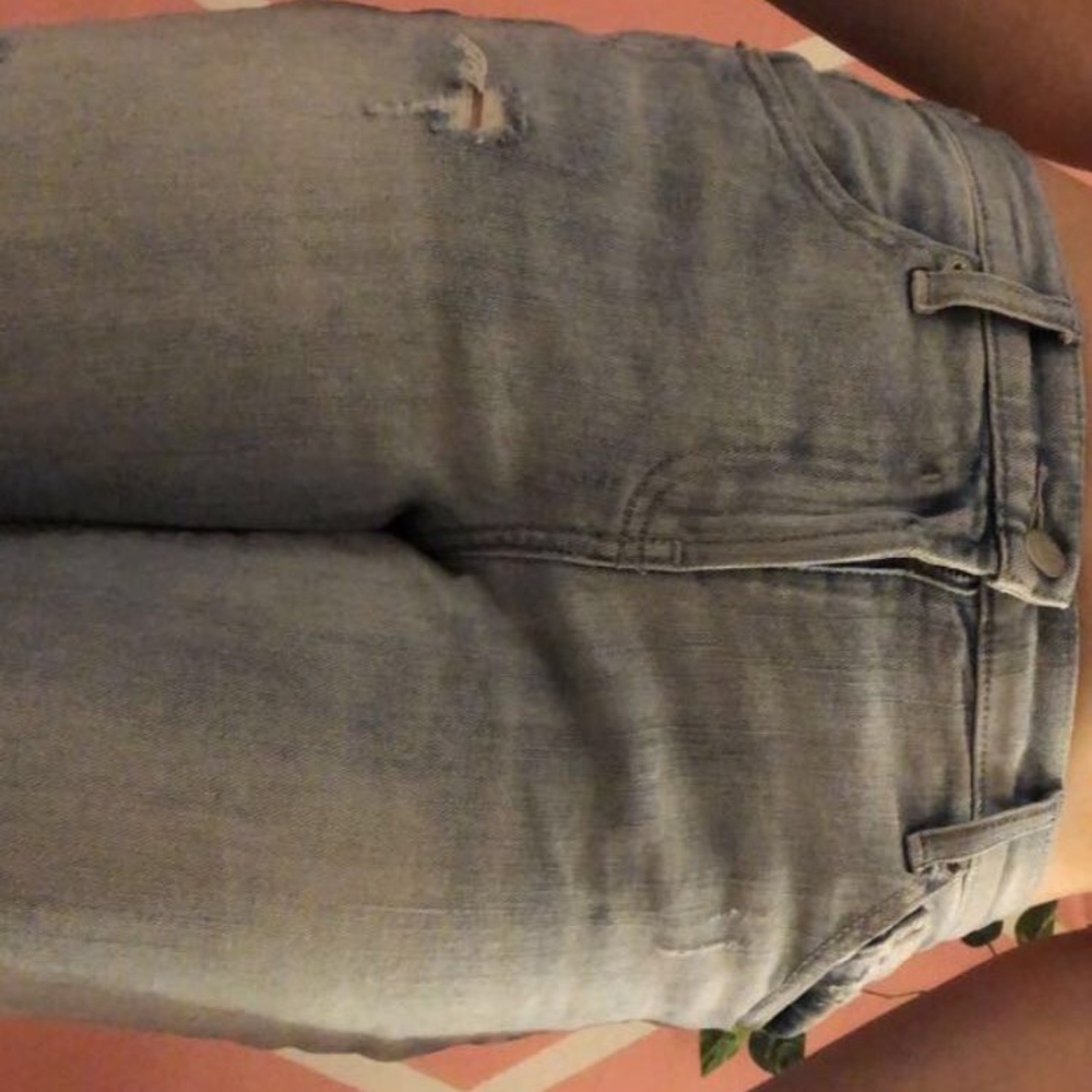 Distressed boyfriend jeans.